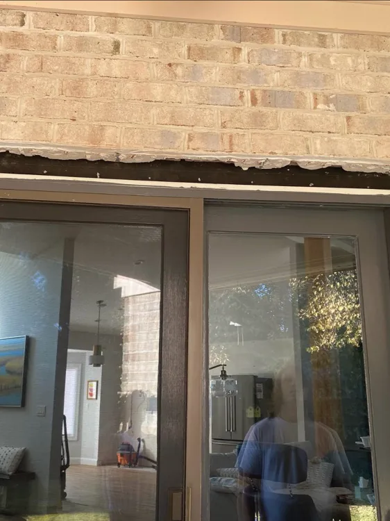 Wider exterior door frame with masonry support visible during construction