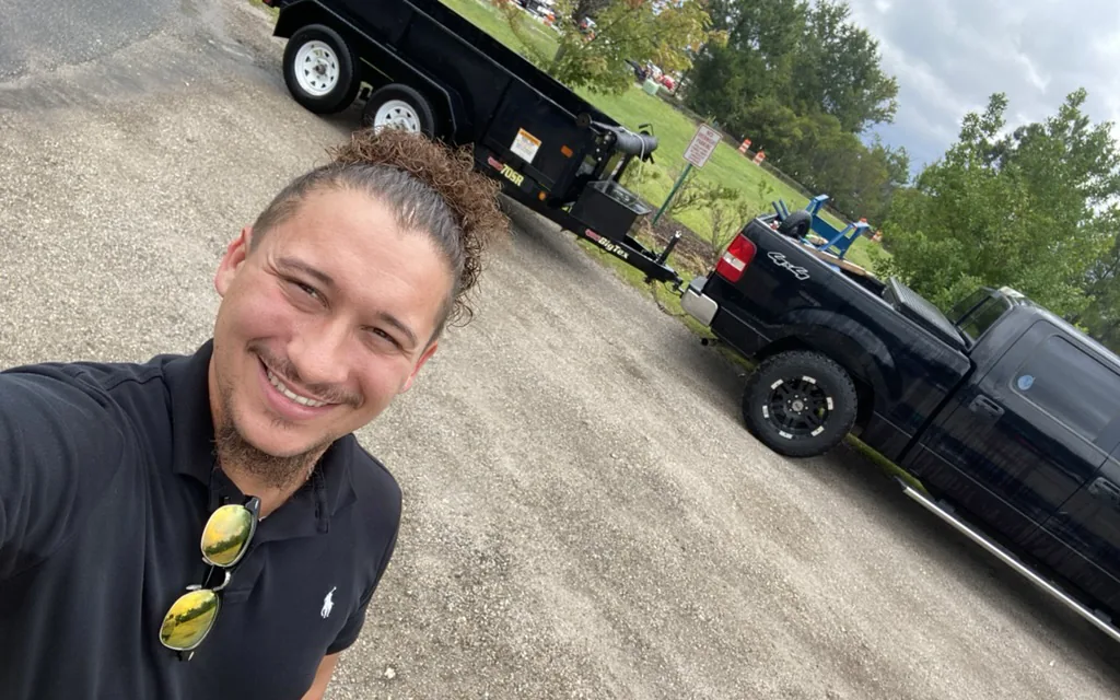 Vic with his work truck and trailer in Eastern North Carolina